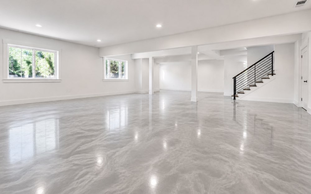 Finished basement with a coated floor