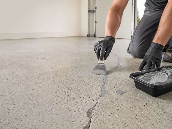 Prepared concrete repair before a new floor system